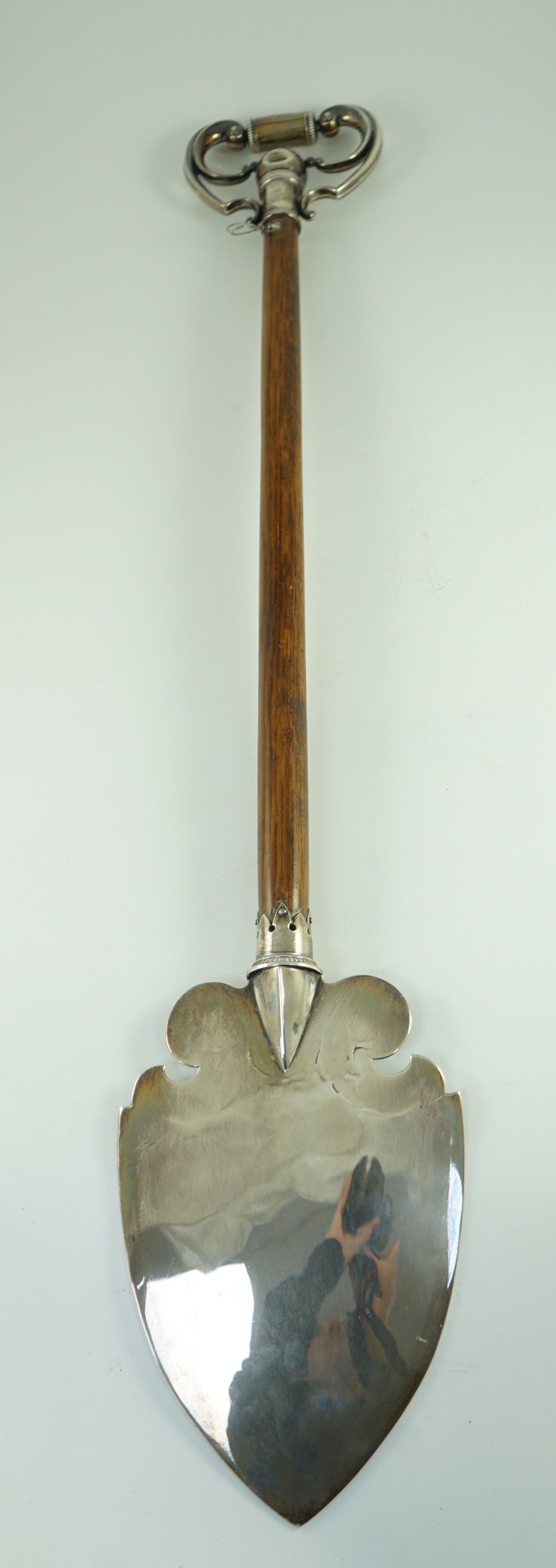 A large George V silver mounted oak presentation spade, by Vaughton & Sons